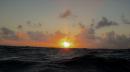 All is calm for sunset-this day, anyway.: After the upheaval of strong winds/seas/swells giving us the corkscrew effect above and below decks, we truly enjoyed the peaceful ride as well as the beautiful sight that sunset gave us.  We enjoyed it while it lasted!